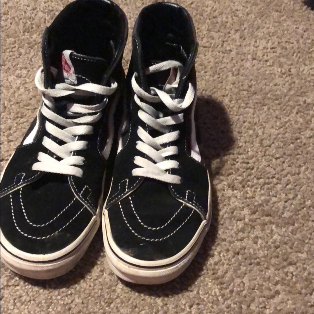 Black Vans with white accents